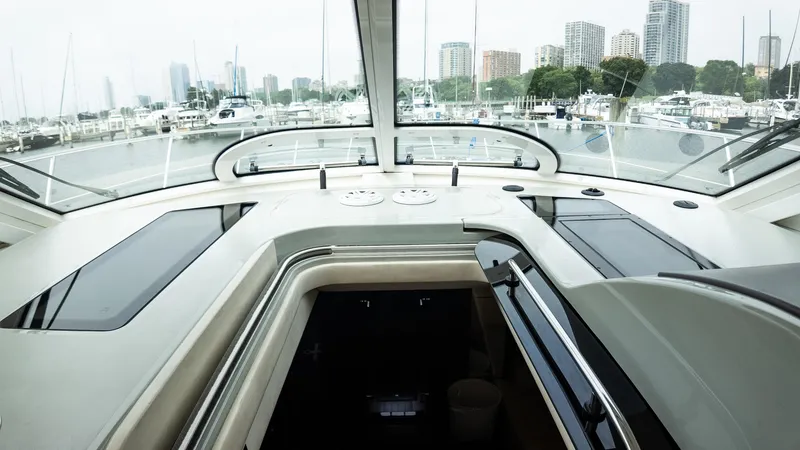 Slide: The Image of 2009 Sea Ray 470 Sundancer yacht interior with marina view. - 26