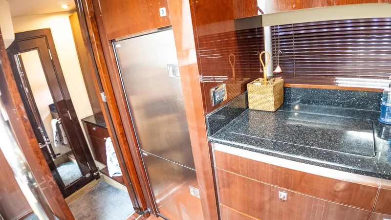 Slide: The Image of Luxurious 2009 Sea Ray 470 Sundancer yacht interior with sleek kitchen and modern amenities. - 33