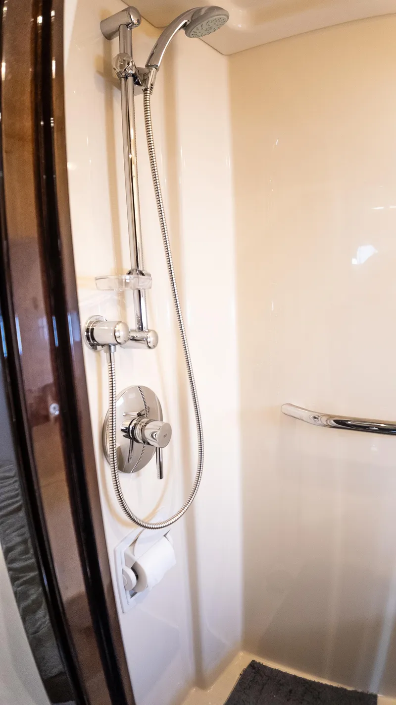 Slide: The Image of Shower area in 2009 Sea Ray 470 Sundancer yacht, featuring modern fixtures and sleek design. - 38