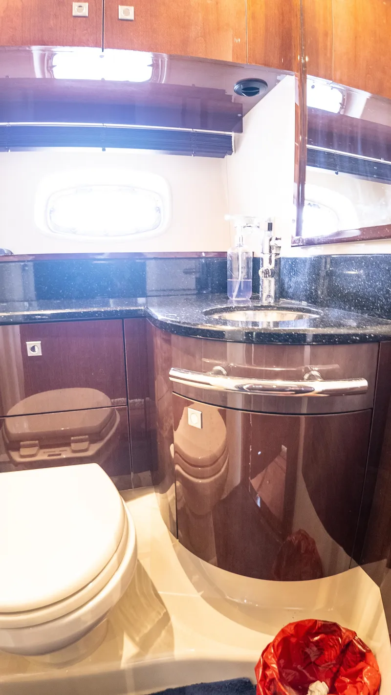 Slide: The Image of Luxurious bathroom interior of 2009 Sea Ray 470 Sundancer yacht with modern fixtures. - 40
