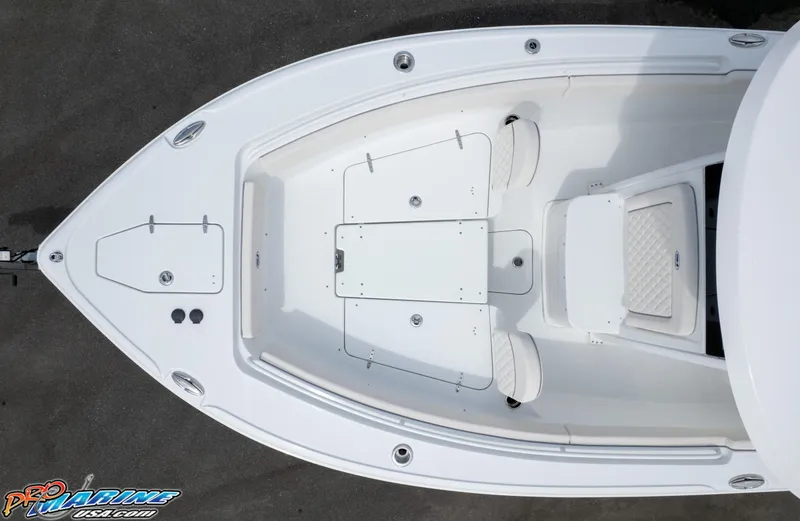 Slide: The Image of 2026 Sea Hunt Ultra 265 SE boat, top view of bow seating and storage compartments. - 18