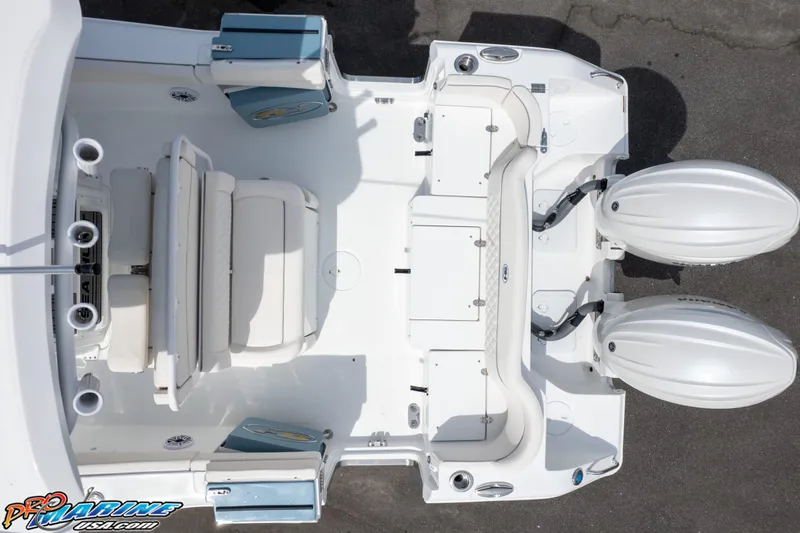 Slide: The Image of Overhead view of 2026 Sea Hunt Ultra 265 SE boat deck with dual engines. - 19