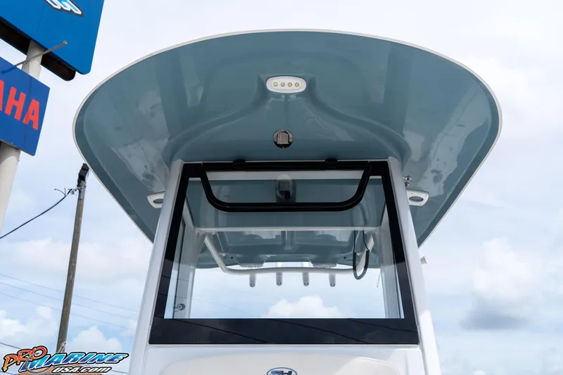 Slide: The Image of 2026 Sea Hunt Ultra 265 SE boat with sleek design and modern features. - 21