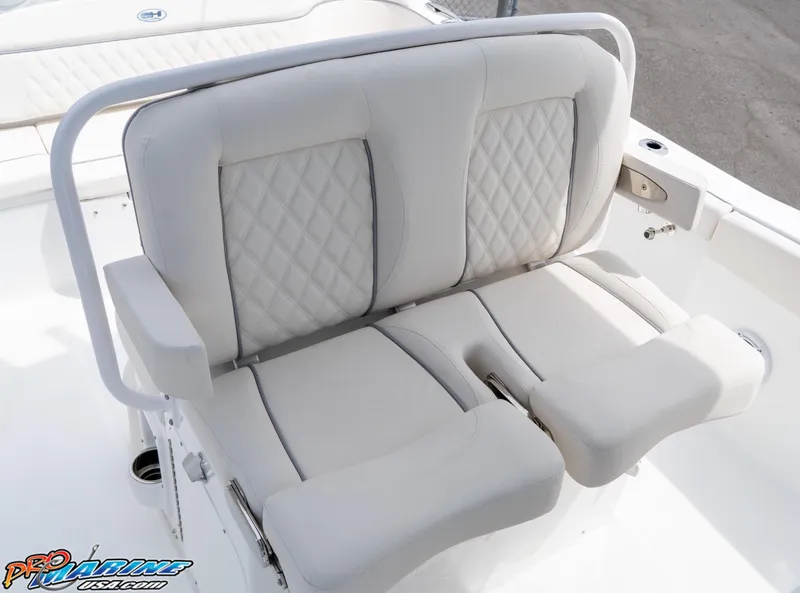 Slide: The Image of Luxury seating on 2026 Sea Hunt Ultra 265 SE boat, featuring white cushioned design. - 27