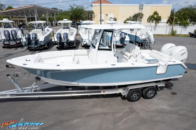 Slide: The Image of 2026 Sea Hunt Ultra 265 SE boat on trailer, displayed at dealership. - 3