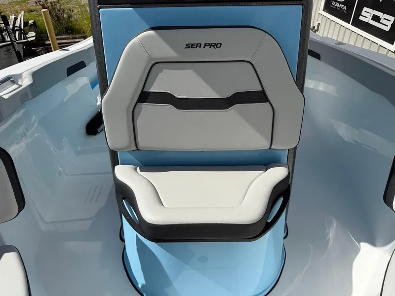 Slide: The Image of 2026 Sea Pro 262 Offshore boat seat with modern design and blue accents. - 20