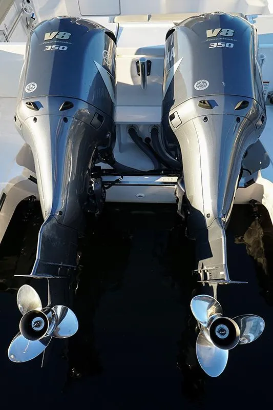 Slide: The Image of Twin V8 350 engines on a 2018 Pursuit OS 355 Offshore boat. - 15