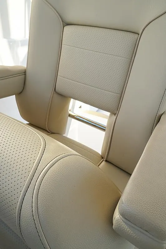 Slide: The Image of Luxurious beige seating on 2018 Pursuit OS 355 Offshore boat. - 7