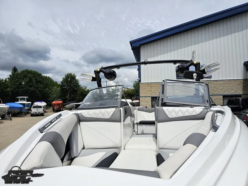 Slide: The Image of 2014 Tigé Z3 boat interior with sleek seating and modern design. - 17