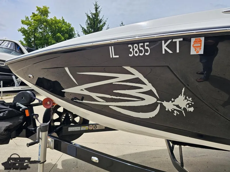 Slide: The Image of 2014 Tigé Z3 boat on trailer with registration number IL 3855 KT. - 19