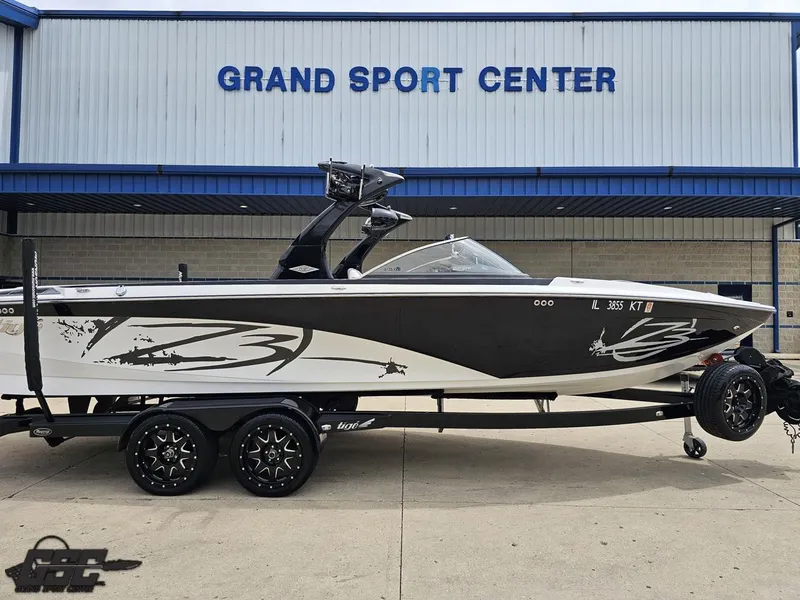 Slide: The Image of 2014 Tigé Z3 boat on trailer at Grand Sport Center. - 3