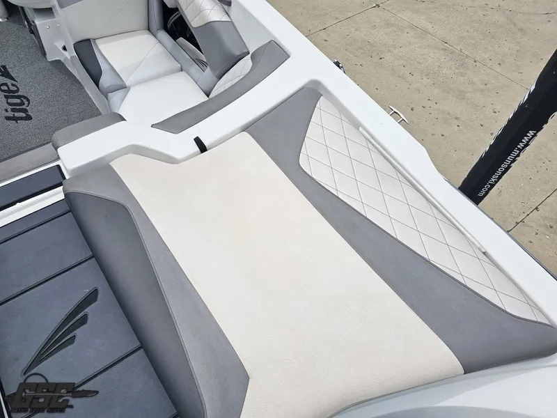 Slide: The Image of 2014 Tigé Z3 boat interior with gray and white upholstery, diamond stitching detail. - 42
