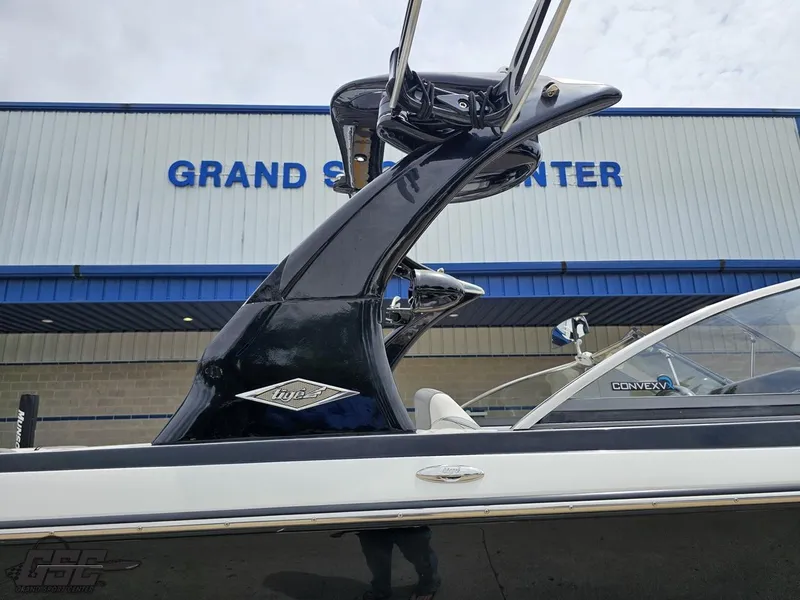 Slide: The Image of 2014 Tigé Z3 boat at Grand Sport Center, featuring sleek design and ConvexV hull. - 8