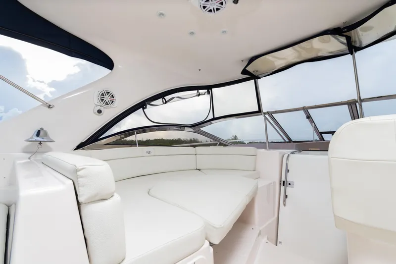 Slide: The Image of 2004 Regal 4260 Commodore yacht interior with white leather seating. - 10