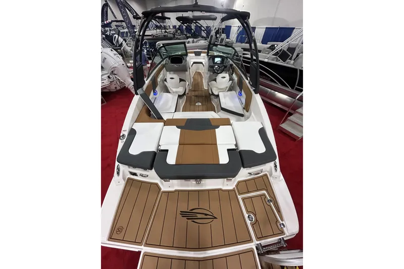 Slide: The Image of 2026 Chaparral 23 SSi boat interior with stylish seating and modern dashboard. - 7