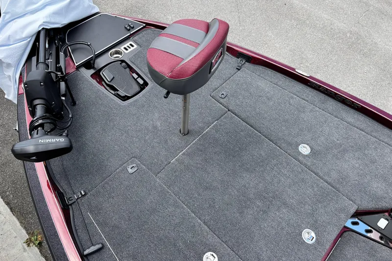 Slide: The Image of 2025 Ranger Z519R boat deck with Garmin equipment and red seat. - 6