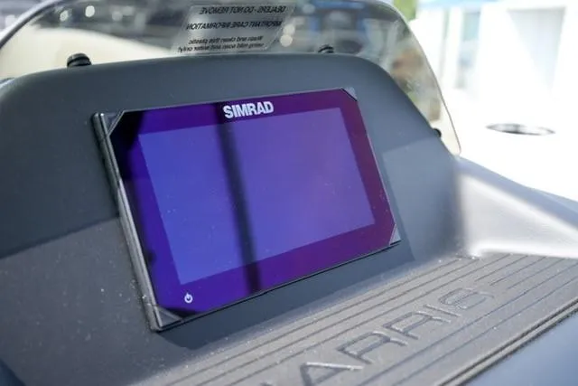 Slide: The Image of 2026 Harris Cruiser 230 dashboard with Simrad display screen. - 13