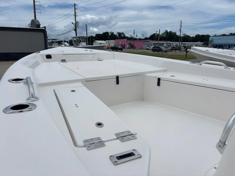 Slide: The Image of 2026 Bay Rider 239 Bay boat deck, featuring spacious storage compartments and sleek design. - 3