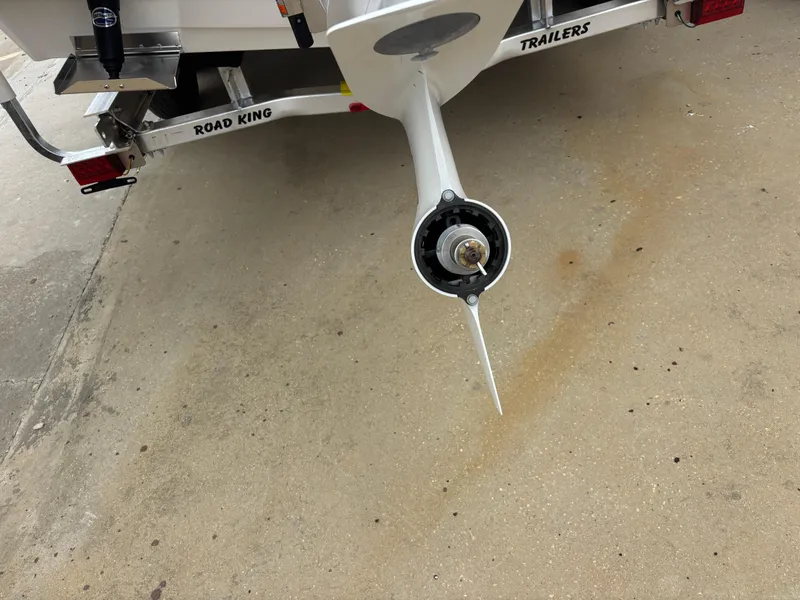 Slide: The Image of Bay Rider 239 Bay 2026 boat trailer with visible propeller and Road King branding. - 8