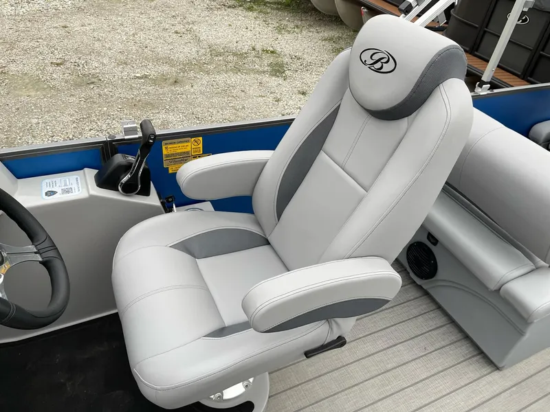 Slide: The Image of Luxurious captain's chair in 2025 Bentley Pontoons Legacy 243 QSB boat. - 13