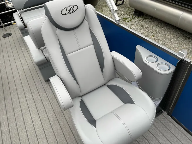 Slide: The Image of Luxurious seating on 2025 Bentley Pontoons Legacy 243 QSB with cup holders. - 17