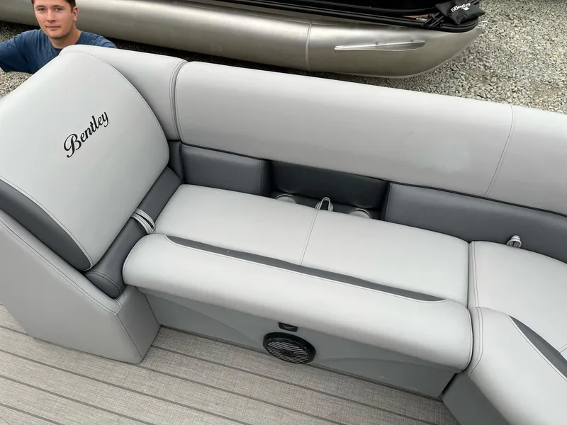 Slide: The Image of 2025 Bentley Pontoons Legacy 243 QSB with luxurious gray seating and sleek design. - 3