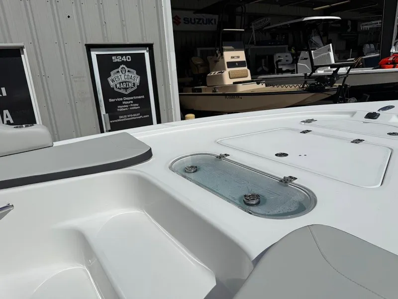 Slide: The Image of 2026 Sea Pro 250 Bay boat at West Coast Marine dealership. - 12