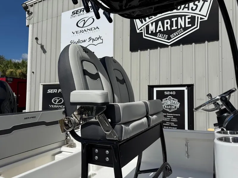 Slide: The Image of 2026 Sea Pro 250 Bay boat interior with dual seats at West Coast Marine. - 8