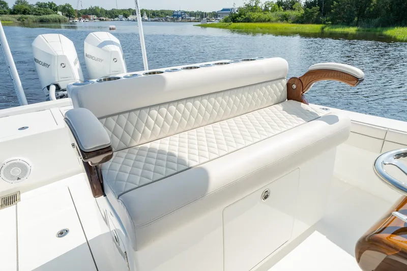 Slide: The Image of 2025 Valhalla Boatworks V-29 Hybrid with luxurious seating and dual Mercury engines. - 12