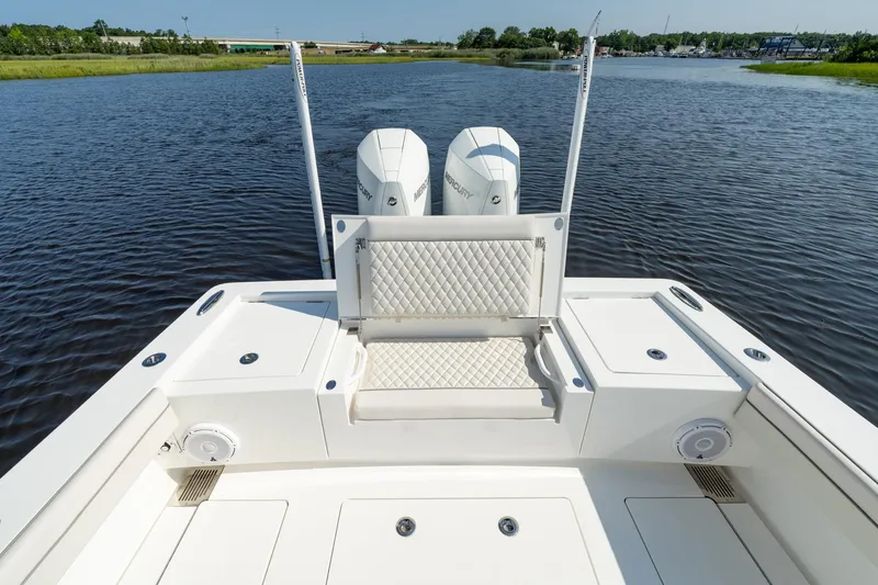 Slide: The Image of 2025 Valhalla Boatworks V-29 Hybrid with dual Mercury engines on calm water. - 13