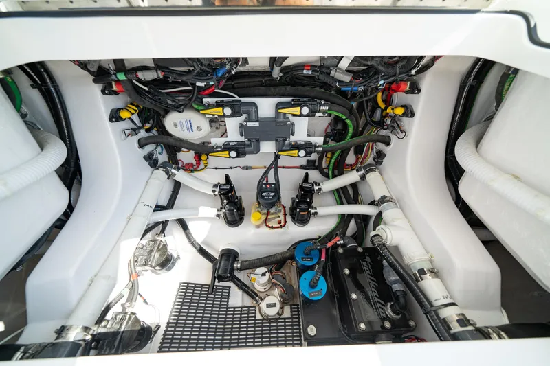 Slide: The Image of Engine compartment of 2025 Valhalla Boatworks V-29 Hybrid, showcasing wiring and components. - 15
