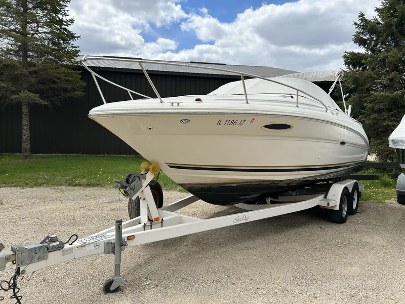 Slide: The Image of 2004 Sea Ray 225 Weekender on trailer, parked outdoors. - 11