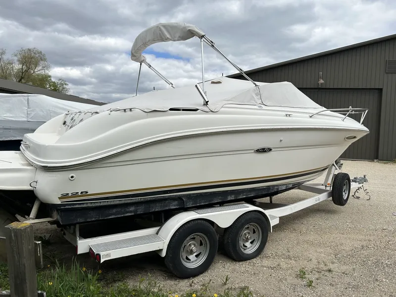 Slide: The Image of 2004 Sea Ray 225 Weekender on trailer, side view. - 13
