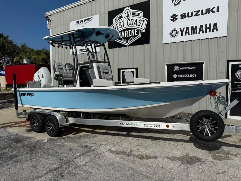 The Image of 2026 Sea Pro 230 Bay boat on trailer at West Coast Marine dealership. - 1