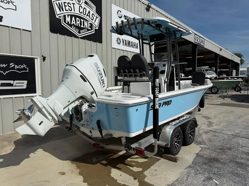 Slide: The Image of 2026 Sea Pro 230 Bay boat with Suzuki engine at West Coast Marine dealership. - 11