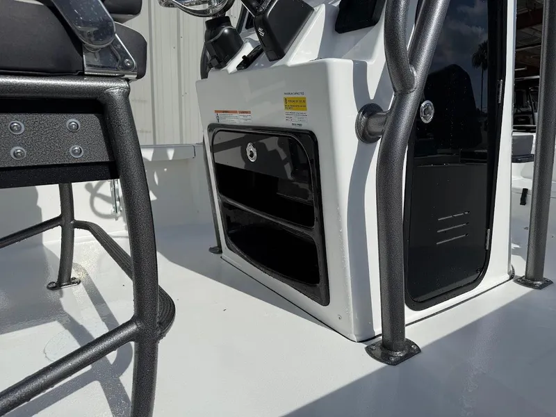 Slide: The Image of 2026 Sea Pro 230 Bay boat interior with console and seating details. - 14