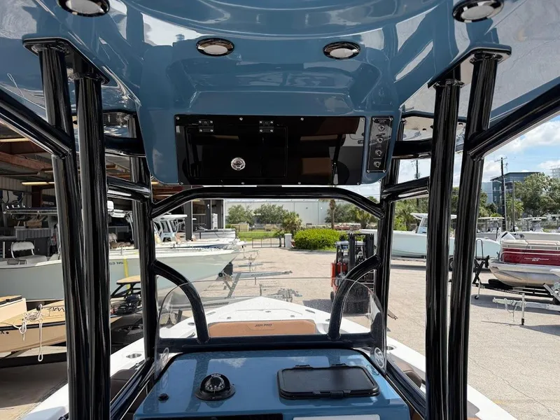 Slide: The Image of Interior view of 2026 Sea Pro 225 Sandbar boat with sleek design and modern features. - 10