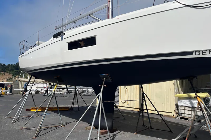 Slide: The Image of 2021 Beneteau Oceanis 30.1 sailboat on stands in a shipyard. - 14