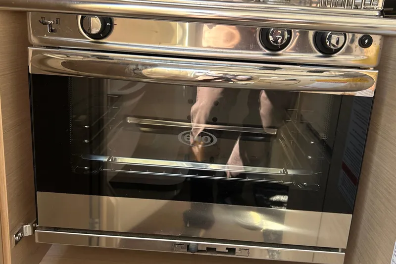 Slide: The Image of Built-in oven in 2021 Beneteau Oceanis 30.1 yacht kitchen. - 28