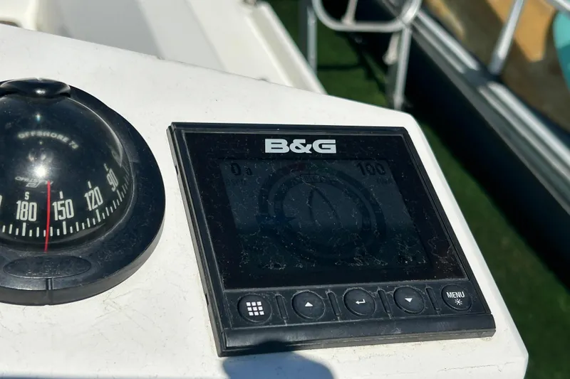 Slide: The Image of Compass and B&G display on 2021 Beneteau Oceanis 30.1 yacht dashboard. - 8