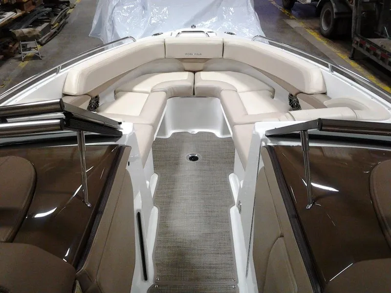 Slide: The Image of 2016 Formula 270 Bowrider interior with beige seating and sleek design. - 16