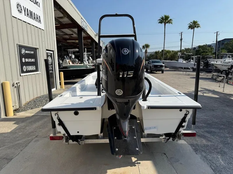 Slide: The Image of 2025 Shallow Sport 18 Sport boat with Yamaha 115 engine at dealership. - 10