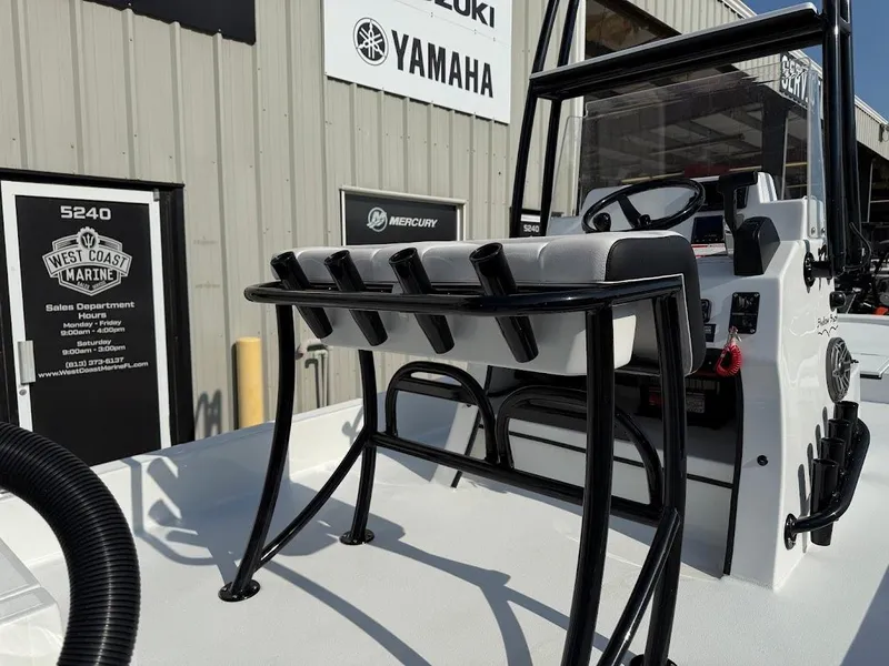 Slide: The Image of 2025 Shallow Sport 18 Sport boat at West Coast Marine dealership. - 12