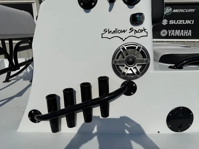 Slide: The Image of 2025 Shallow Sport 18 Sport boat console with speaker and rod holders. - 4