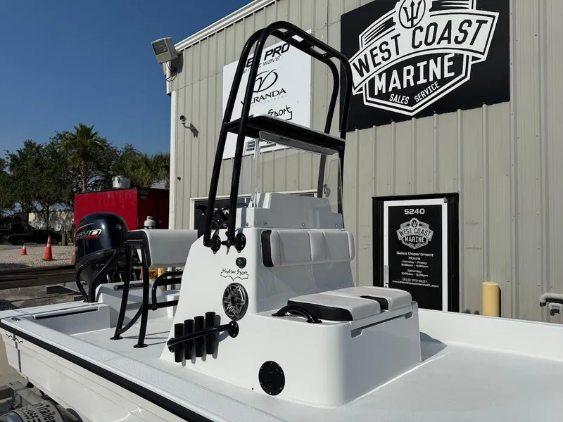 Slide: The Image of 2025 Shallow Sport 18 Sport boat at West Coast Marine dealership. - 5