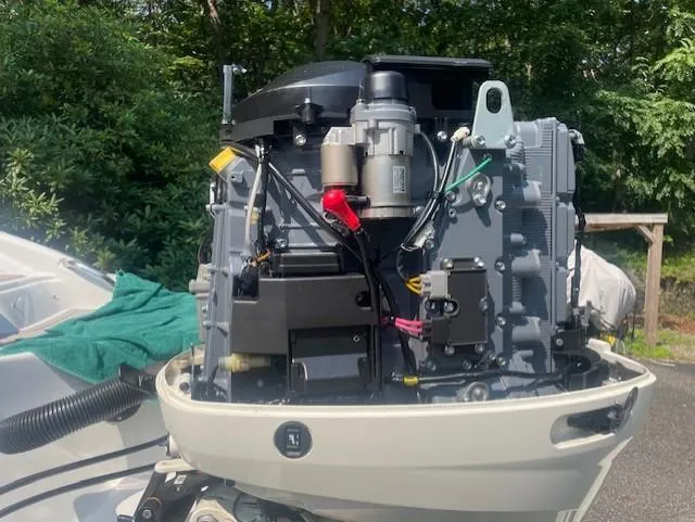 Slide: The Image of 2018 Crownline Eclipse E215 XS boat engine, detailed view, outdoors. - 23