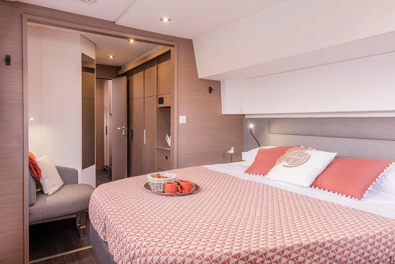 The Image of Luxurious bedroom interior of 2025 Fountaine Pajot Aura 51 catamaran. - 0