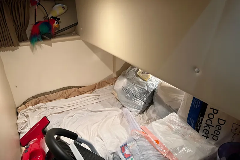 Slide: The Image of Luxurious interior of 2003 Carver 466 Motor Yacht with cream leather seating. - 19