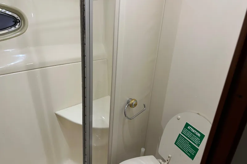 Slide: The Image of Bathroom in 2003 Carver 466 Motor Yacht with shower and toilet. - 22