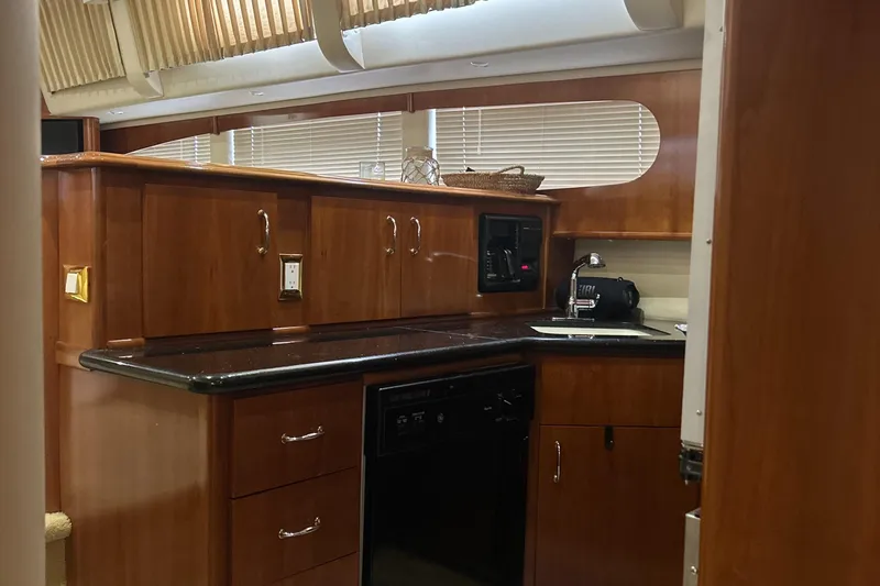 Slide: The Image of Front-loading washer with caution and energy labels, Carver 466 Motor Yacht 2003 model. - 27